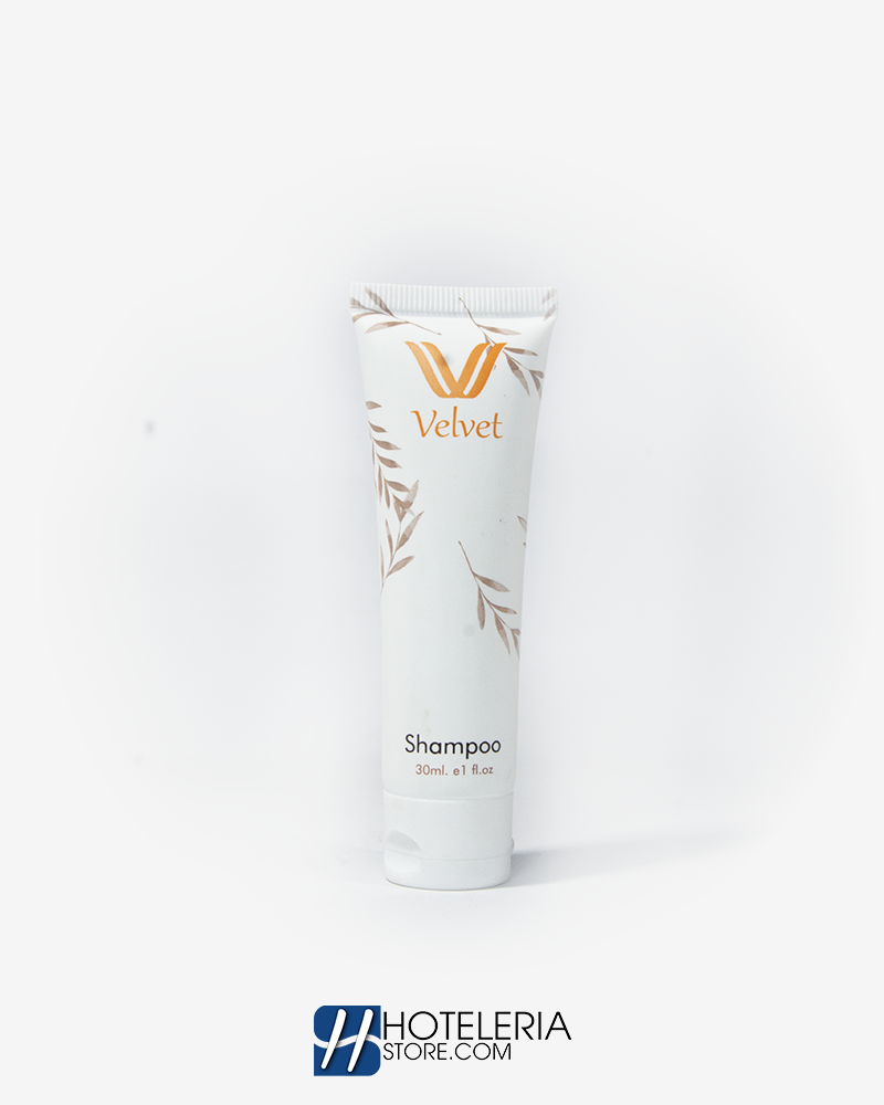 Shampoo Velvet con fórmula equilibrada y aroma a almendra y nuez, ideal para huéspedes de hoteles business